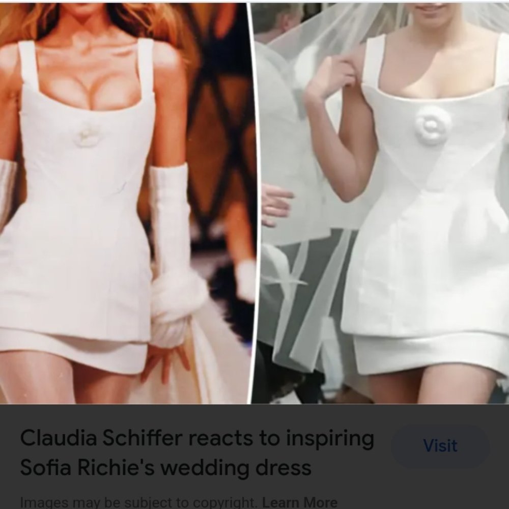 Bridal cape and Camilla pin